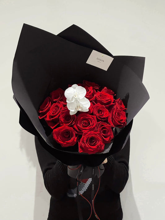 Red roses and orchids